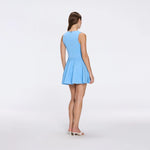 Meditara Blue Knit Mini Dress with Flared Skirt and Gold Button Details | Moeva | RTW Dresses | Each week unveils new pieces—luxury swimwear, fluid resort silhouettes, and elevated summer-to-evening essentials designed to carry you from coastal escapes to city nights.