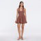 Meditara Brown Knit Mini Dress with Flared Skirt and Gold Button Details | Moeva | RTW Dresses | Each week unveils new pieces—luxury swimwear, fluid resort silhouettes, and elevated summer-to-evening essentials designed to carry you from coastal escapes to city nights.