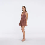 Meditara Brown Knit Mini Dress with Flared Skirt and Gold Button Details | Moeva | RTW Dresses | Each week unveils new pieces—luxury swimwear, fluid resort silhouettes, and elevated summer-to-evening essentials designed to carry you from coastal escapes to city nights.