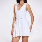 Meditara White Knit Mini Dress with Flared Skirt and Gold Button Details | Moeva | RTW Dresses | Each week unveils new pieces—luxury swimwear, fluid resort silhouettes, and elevated summer-to-evening essentials designed to carry you from coastal escapes to city nights.
