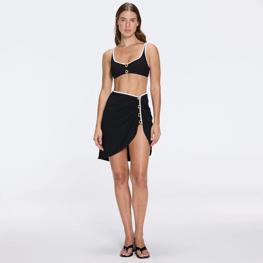 Mirazur Gold Buttoned High-Waist Mini Black Skirt | Moeva | Skirt | Each week unveils new pieces—luxury swimwear, fluid resort silhouettes, and elevated summer-to-evening essentials designed to carry you from coastal escapes to city nights.