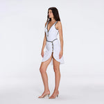 Mirazur Gold Buttoned High-Waist Mini White Skirt | Moeva | Beachwear Skirts | Each week unveils new pieces—luxury swimwear, fluid resort silhouettes, and elevated summer-to-evening essentials designed to carry you from coastal escapes to city nights.