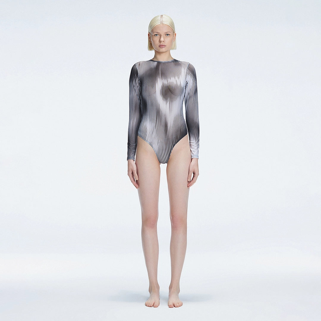 Mireya Black Optical Long Sleeve Bodysuit | Moeva | One-Piece | Each week unveils new pieces—luxury swimwear, fluid resort silhouettes, and elevated summer-to-evening essentials designed to carry you from coastal escapes to city nights.