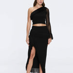 Monroe Black One-Shoulder Knit Top with Fringe & Mesh Sleeve | Moeva | RTW Bustiers | Each week unveils new pieces—luxury swimwear, fluid resort silhouettes, and elevated summer-to-evening essentials designed to carry you from coastal escapes to city nights.