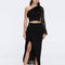 Monroe Black One-Shoulder Knit Top with Fringe & Mesh Sleeve | Moeva | RTW Bustiers | Each week unveils new pieces—luxury swimwear, fluid resort silhouettes, and elevated summer-to-evening essentials designed to carry you from coastal escapes to city nights.