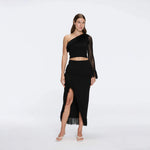 Alani Black Fringe Detail Asymmetric Slit Midi Skirt | Moeva | RTW Skirts | Each week unveils new pieces—luxury swimwear, fluid resort silhouettes, and elevated summer-to-evening essentials designed to carry you from coastal escapes to city nights.