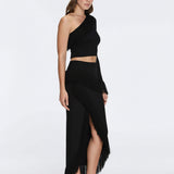 Monroe & Alani Fringe Asymmetric Knit Black Set | Moeva | | Each week unveils new pieces—luxury swimwear, fluid resort silhouettes, and elevated summer-to-evening essentials designed to carry you from coastal escapes to city nights.