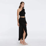 Monroe Black One-Shoulder Knit Top with Fringe & Mesh Sleeve | Moeva | RTW Bustiers | Each week unveils new pieces—luxury swimwear, fluid resort silhouettes, and elevated summer-to-evening essentials designed to carry you from coastal escapes to city nights.