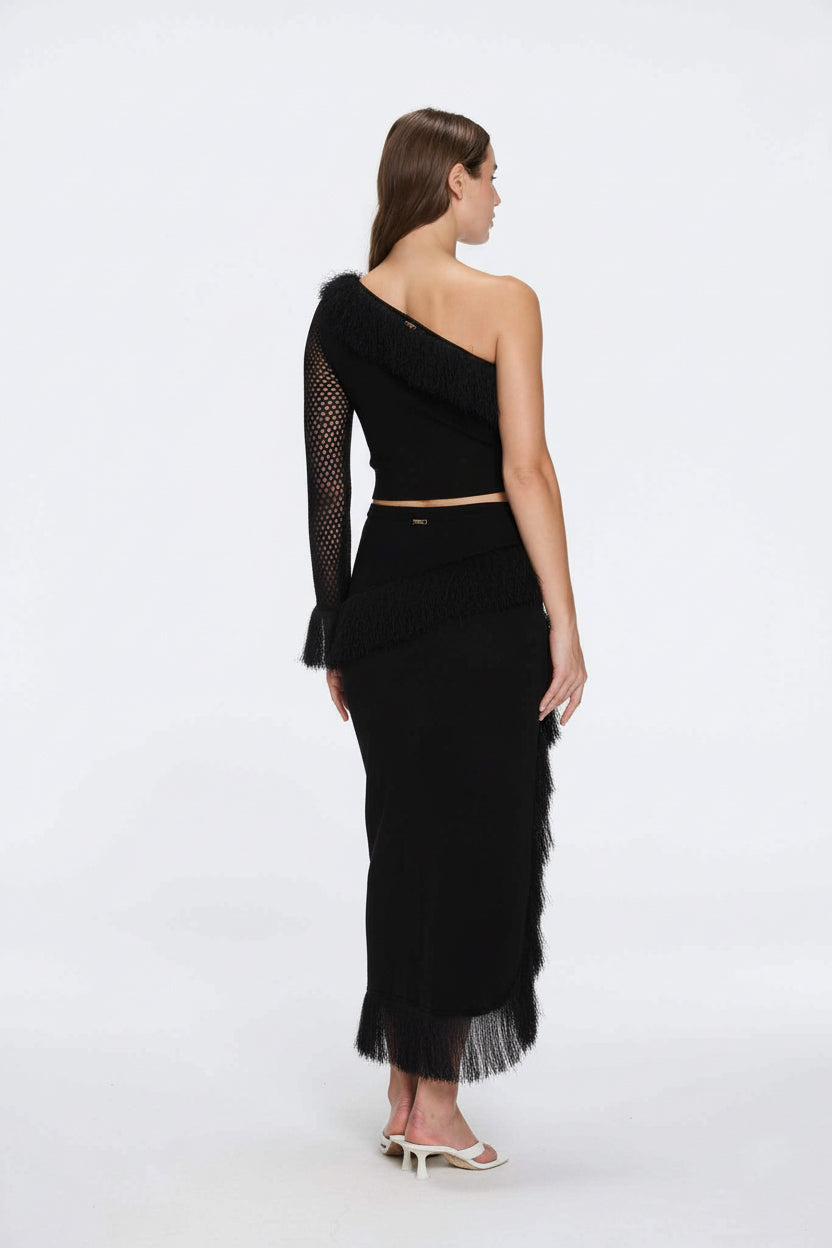 Monroe & Alani Fringe Asymmetric Knit Black Set | Moeva | | Each week unveils new pieces—luxury swimwear, fluid resort silhouettes, and elevated summer-to-evening essentials designed to carry you from coastal escapes to city nights.