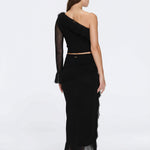 Monroe & Alani Fringe Asymmetric Knit Black Set | Moeva | | Each week unveils new pieces—luxury swimwear, fluid resort silhouettes, and elevated summer-to-evening essentials designed to carry you from coastal escapes to city nights.