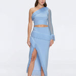 Monroe & Alani Fringe Asymmetric Knit Blue Set | Moeva | | Each week unveils new pieces—luxury swimwear, fluid resort silhouettes, and elevated summer-to-evening essentials designed to carry you from coastal escapes to city nights.