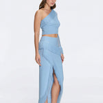 Monroe & Alani Fringe Asymmetric Knit Blue Set | Moeva | | Each week unveils new pieces—luxury swimwear, fluid resort silhouettes, and elevated summer-to-evening essentials designed to carry you from coastal escapes to city nights.