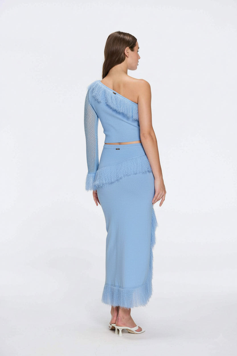 Monroe & Alani Fringe Asymmetric Knit Blue Set | Moeva | | Each week unveils new pieces—luxury swimwear, fluid resort silhouettes, and elevated summer-to-evening essentials designed to carry you from coastal escapes to city nights.