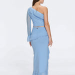 Monroe & Alani Fringe Asymmetric Knit Blue Set | Moeva | | Each week unveils new pieces—luxury swimwear, fluid resort silhouettes, and elevated summer-to-evening essentials designed to carry you from coastal escapes to city nights.