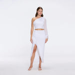 Monroe White One-Shoulder Knit Top with Fringe & Mesh Sleeve | Moeva | RTW Bustiers | Each week unveils new pieces—luxury swimwear, fluid resort silhouettes, and elevated summer-to-evening essentials designed to carry you from coastal escapes to city nights.