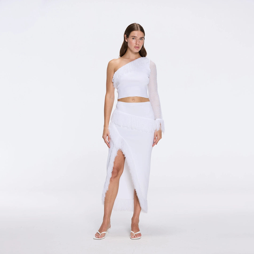 Monroe & Alani Fringe Asymmetric Knit White Set | Moeva | | Each week unveils new pieces—luxury swimwear, fluid resort silhouettes, and elevated summer-to-evening essentials designed to carry you from coastal escapes to city nights.