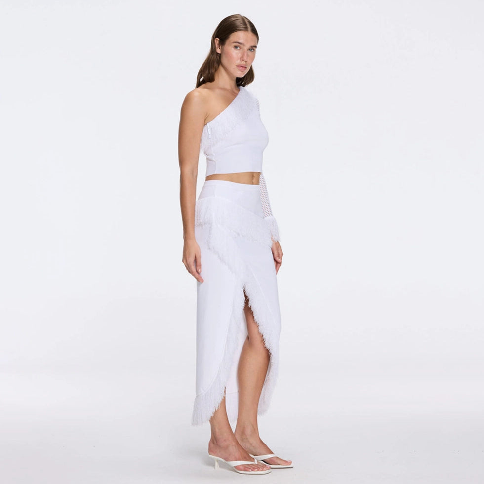 Monroe & Alani Fringe Asymmetric Knit White Set | Moeva | Set | Each week unveils new pieces—luxury swimwear, fluid resort silhouettes, and elevated summer-to-evening essentials designed to carry you from coastal escapes to city nights.