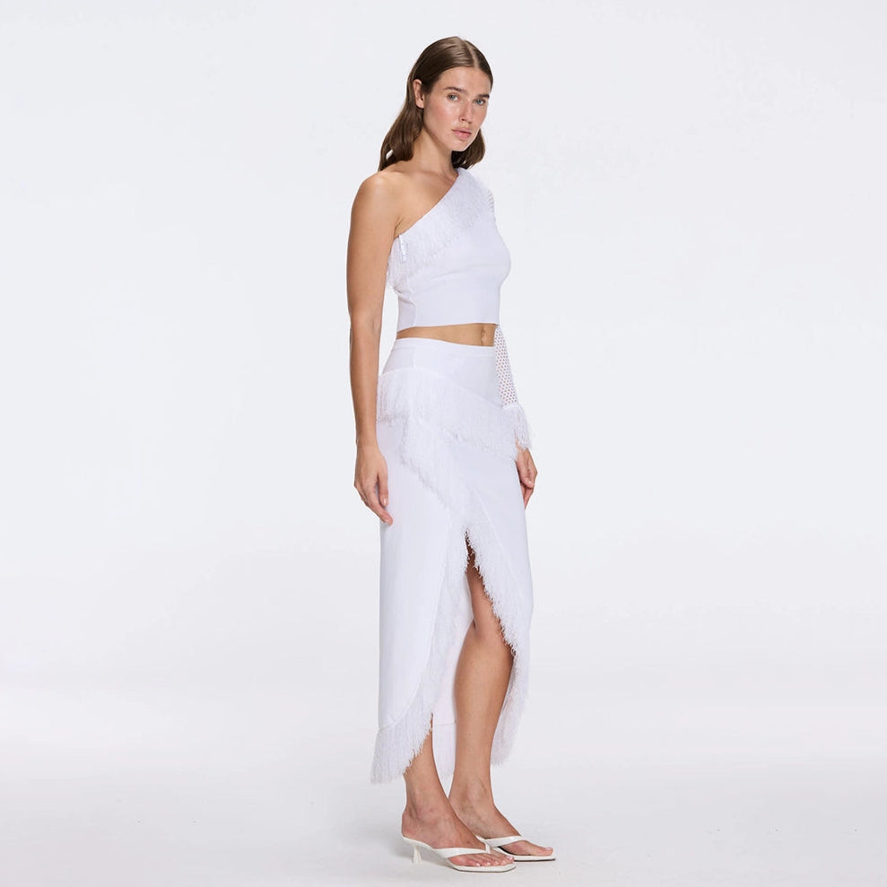 Alani White Fringe Detail Asymmetric Slit Midi Skirt | Moeva | RTW Skirts | Each week unveils new pieces—luxury swimwear, fluid resort silhouettes, and elevated summer-to-evening essentials designed to carry you from coastal escapes to city nights.