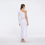 Monroe White One-Shoulder Knit Top with Fringe & Mesh Sleeve | Moeva | RTW Bustiers | Each week unveils new pieces—luxury swimwear, fluid resort silhouettes, and elevated summer-to-evening essentials designed to carry you from coastal escapes to city nights.