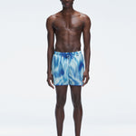 Griffin Blue Sonar Swim Shorts with front tie cords and side piping, laid flat for a detailed view.
