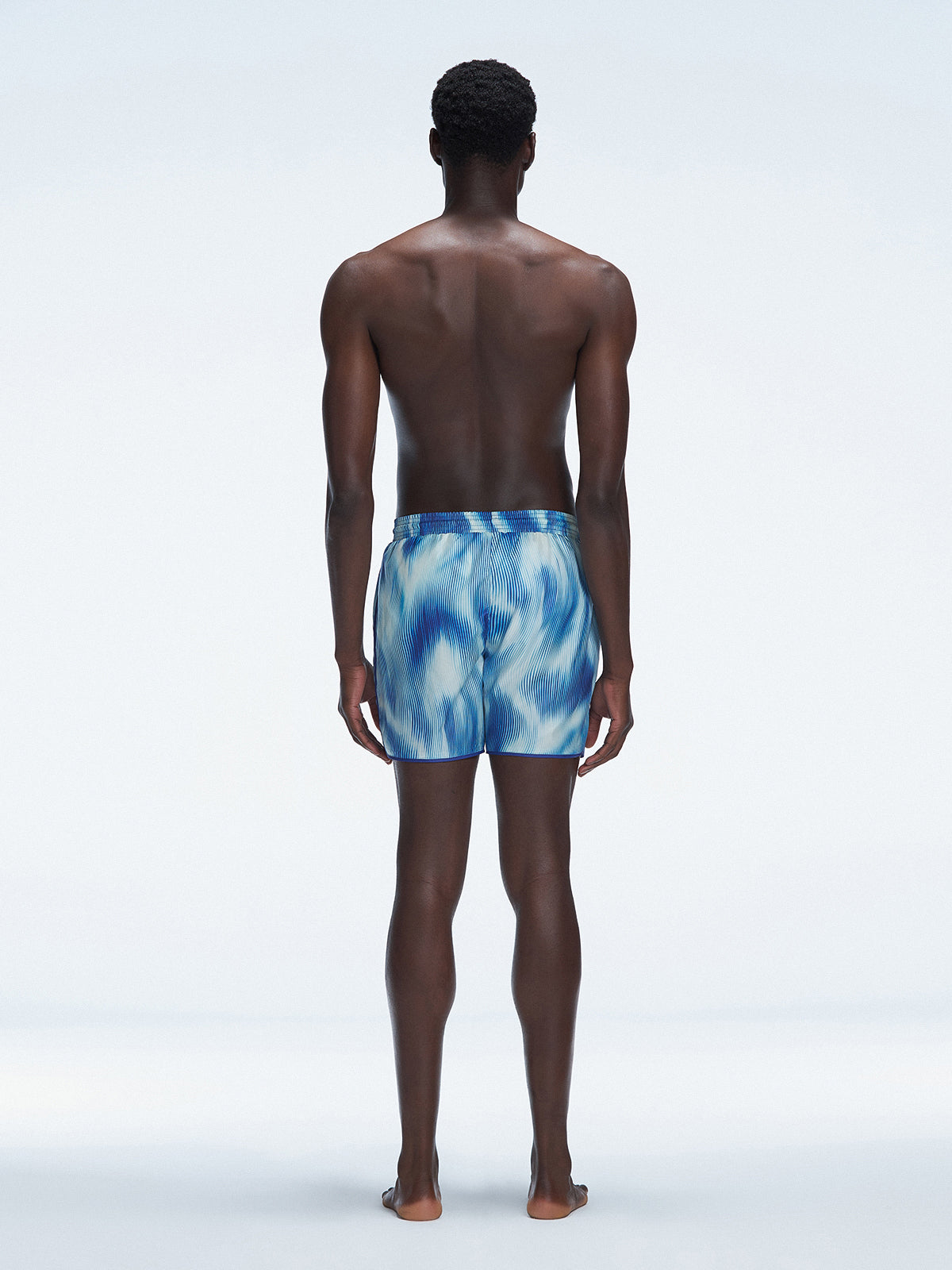 Back view of Griffin Blue Sonar Swim Shorts, displaying the bold blue print and sporty design.
