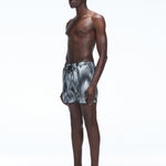 Griffin Black Sonar Swim Shorts, close-up of side piping and tie cords on the elasticated waistband.
