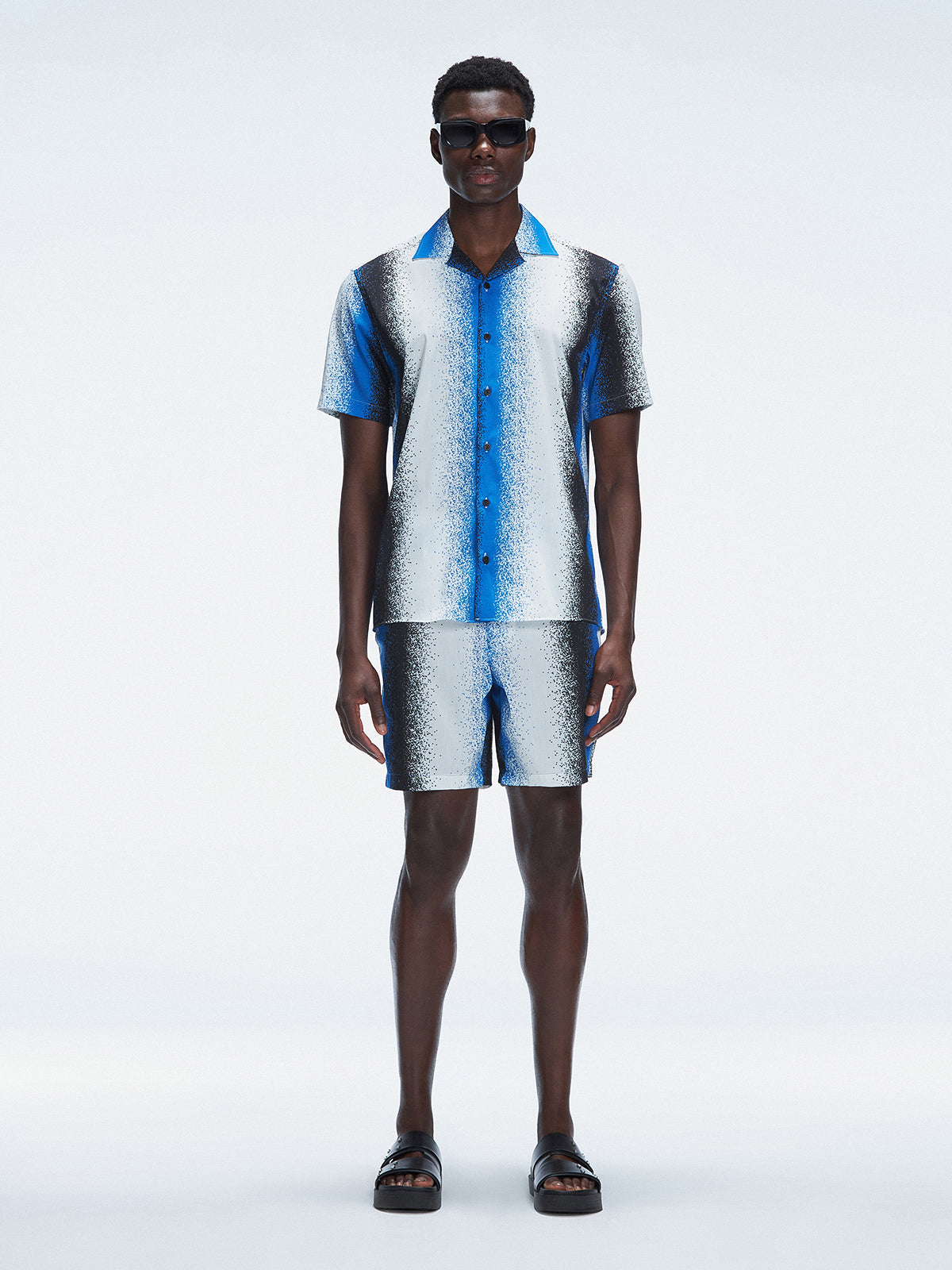 Model wearing the Caspian Blue Degraded Shirt with oversized fit and button-through front.