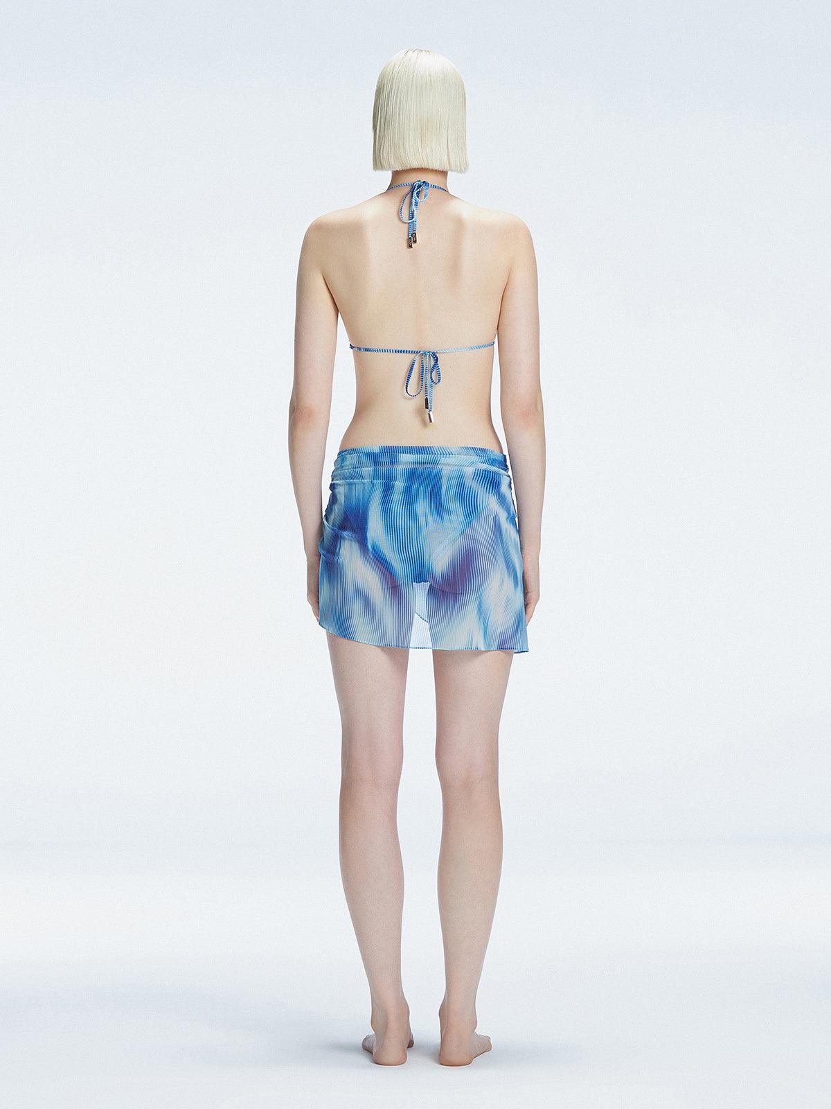 "back view of the printed fabric on the Evita Blue Sarong, emphasizing its elegant design