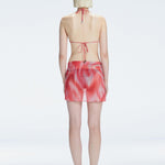 "back view of the printed fabric on the Evita Red Sarong, emphasizing its elegant design