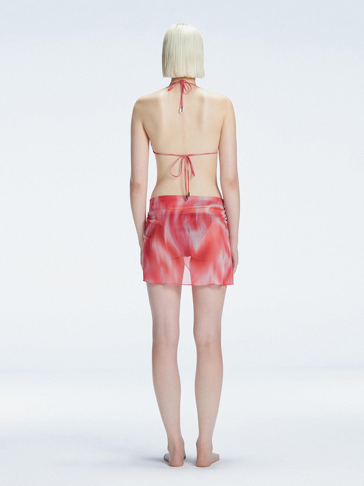 "back view of the printed fabric on the Evita Red Sarong, emphasizing its elegant design