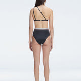Back view of model wearing Eva Black Optical Bikini Set , highlighting the high-waisted fit and full coverage.
