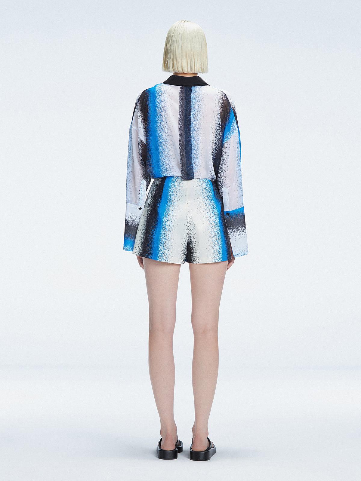 "Back view of the Janine Blue Degraded Shirt, highlighting its clean lines and stylish design.