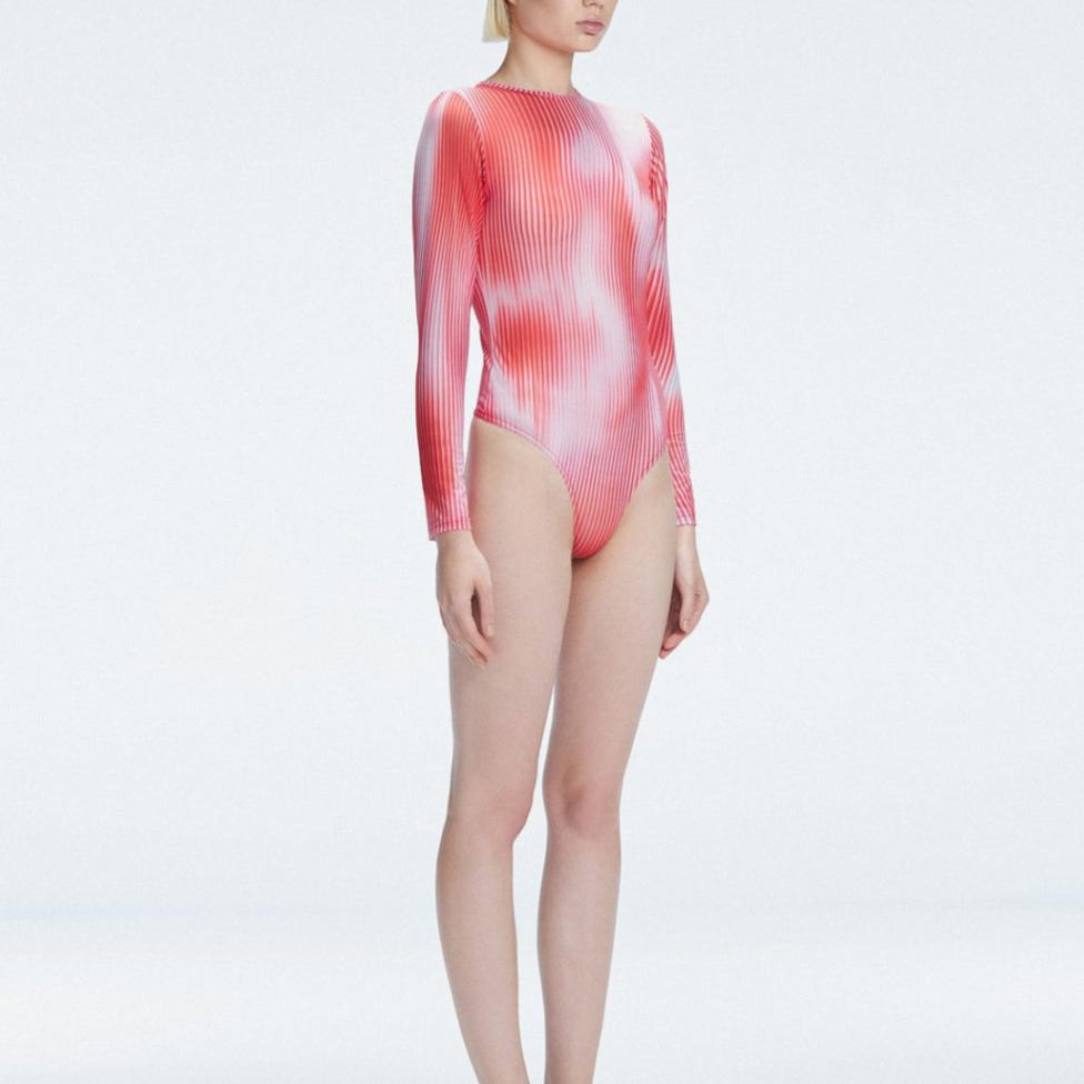 Mireya Red Optical Long Sleeve Bodysuit | Moeva | Crop Top | Each week unveils new pieces—luxury swimwear, fluid resort silhouettes, and elevated summer-to-evening essentials designed to carry you from coastal escapes to city nights.