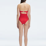 "Back view of the buckle and ruched chest detail on the Zephyrine Red Bandeau Swimsuit, showcasing its stylish design."
