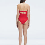 "Back view of the buckle and ruched chest detail on the Zephyrine Red Bandeau Swimsuit, showcasing its stylish design."
