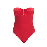 "Zephyrine Red Swimsuit laid flat, showcasing the removable straps, buckle, and ruched chest detail."
