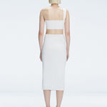 Back view of model wearing Lane Top and Esmeralda White Midi Skirt, highlighting the seamless hidden zipper.
