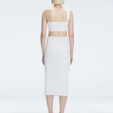 Back view of model wearing Lane Top and Esmeralda White Midi Skirt, highlighting the seamless hidden zipper.
