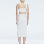 Back view of model wearing Lane White Top, highlighting the sleek one-shoulder silhouette.
