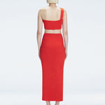 Back view of model wearing Lane Red Top, highlighting the sleek one-shoulder silhouette.
