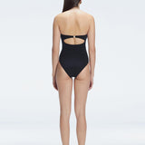 "Back view of the buckle and ruched chest detail on the Zephyrine Black Bandeau Swimsuit, showcasing its stylish design."
