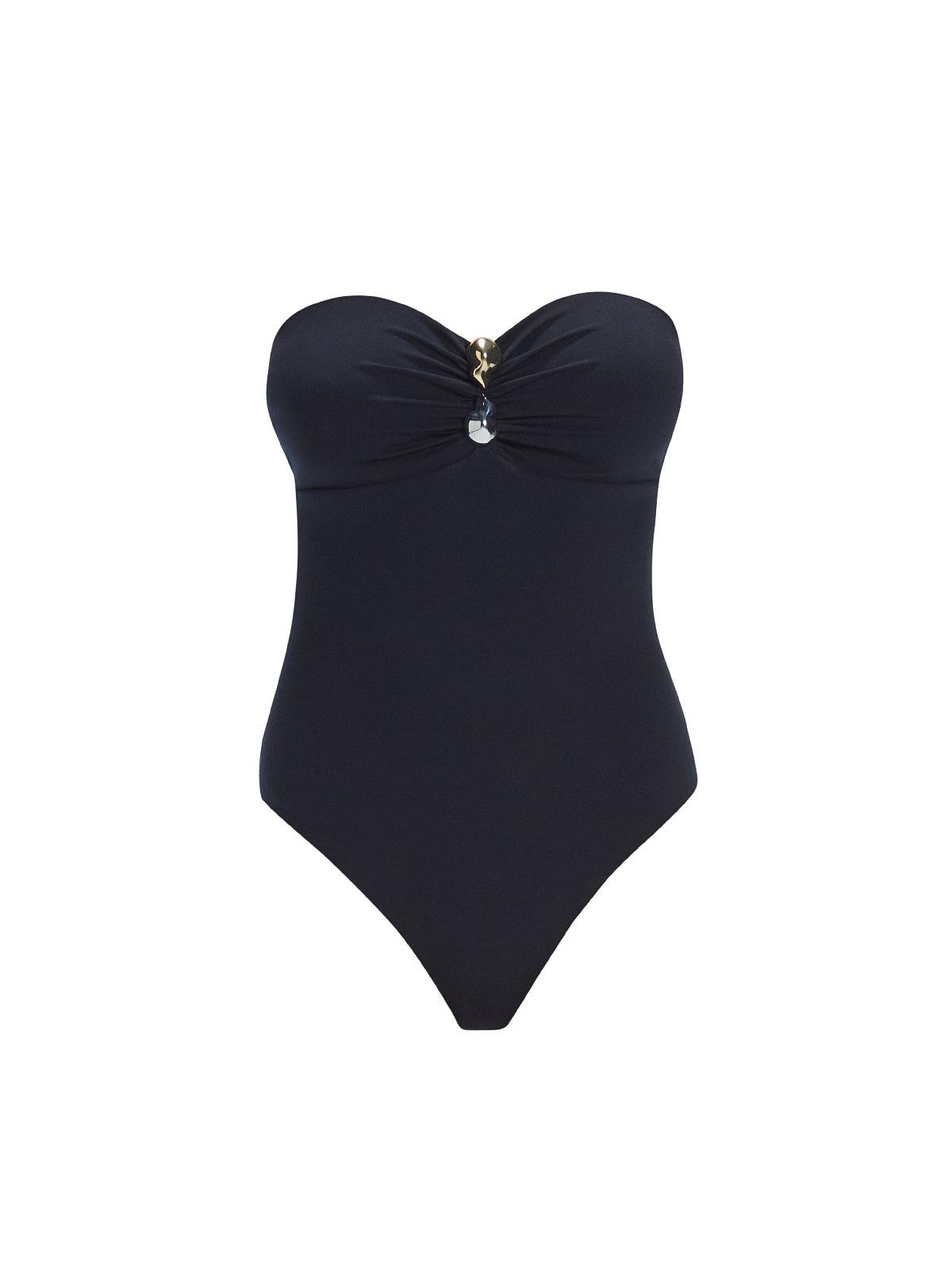 "Zephyrine Black Swimsuit laid flat, showcasing the removable straps, buckle, and ruched chest detail."
