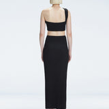 Back view of model wearing Lane Black Top, highlighting the sleek one-shoulder silhouette.
