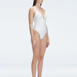 "Side view of the underwire and ruched front on the Emma White Swimsuit, emphasizing the premium fabric and elegant design."
