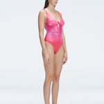 "Side view of the underwire and ruched front on the Emma Gradient Swimsuit, emphasizing the premium fabric and elegant design."
