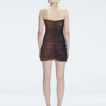 Back view of the Marsiela Black-Nude Mini Dress, showcasing the hidden zipper and elegant design