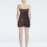 Back view of the Marsiela Black-Nude Mini Dress, showcasing the hidden zipper and elegant design