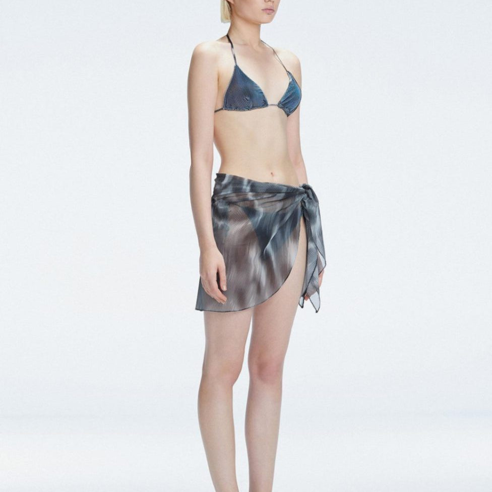 Evita Black Optical Tie Side Sarong | Moeva | Sarong | Each week unveils new pieces—luxury swimwear, fluid resort silhouettes, and elevated summer-to-evening essentials designed to carry you from coastal escapes to city nights.