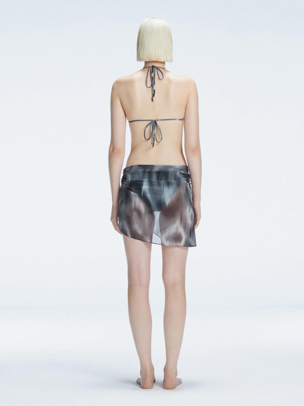 "back view of the printed fabric on the Evita Black Sarong, emphasizing its elegant design