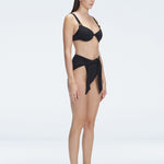 "Side view of the underwired V-neck and twist-front detail on the Madelyn Black Bikini Top and Dylan Bikini Bottom, emphasizing its elegant design."
